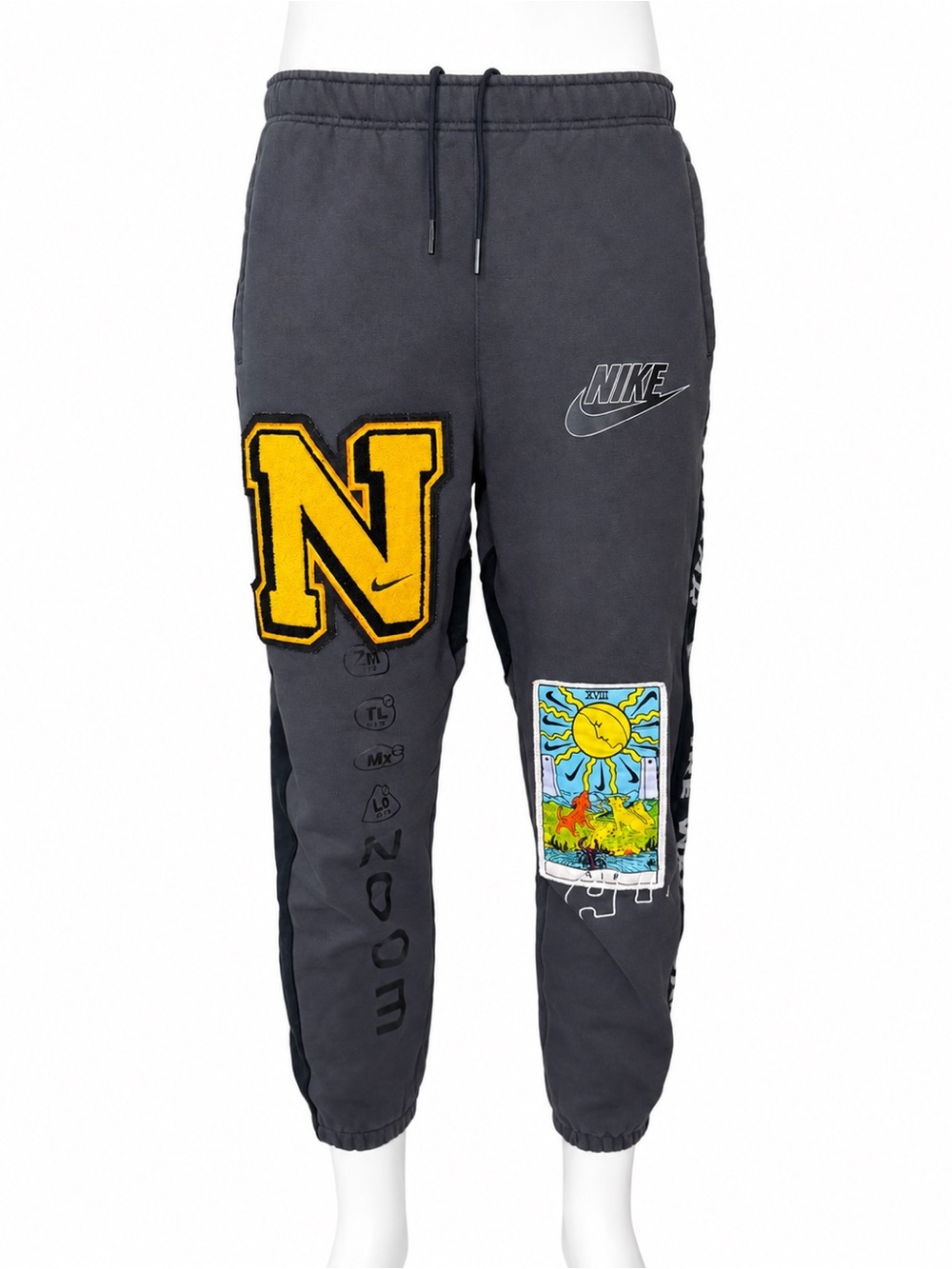 Nike Kids Charcoal Joggers with Yellow Patch and Colorful Graphic